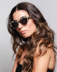 Tortoise brune brune / plage noire